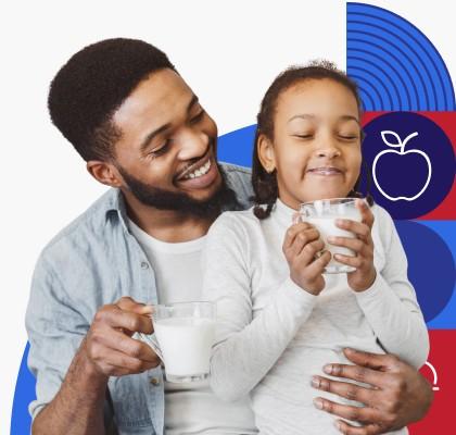 Father and son drinking milk