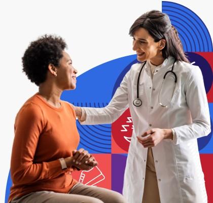 A female health care provider talks with a female patient.