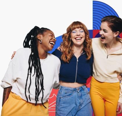 Three women laughing.